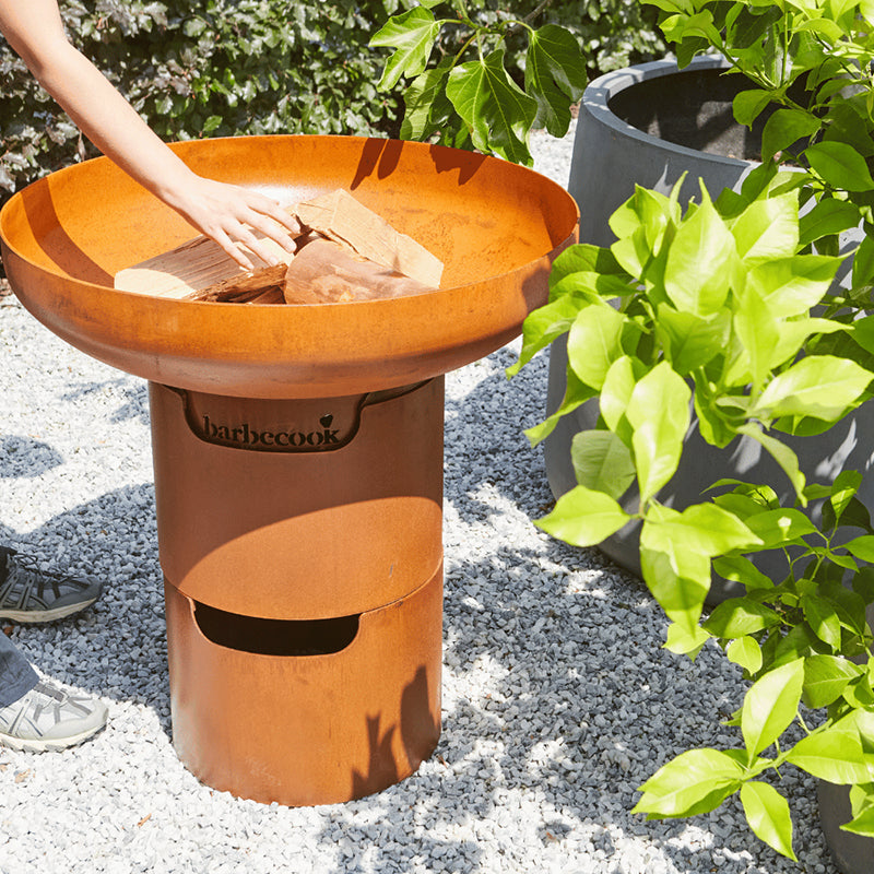 Barbecook Jack Firepit with bases building fire