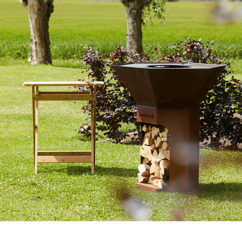 Barbecook Nestor grill in garden with table