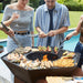 Barbecook Nestor island with people cooking