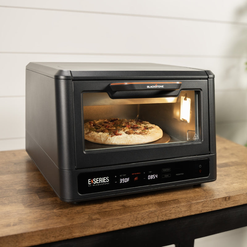 Blackstone Electric Pizza and Airfryer Combo Cooking pizza