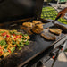 Blackstone 2310 36in Iron Forged Griddle with Hood Cooking chicken and pasta