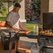 Blackstone 2310 36in Iron Forged Griddle with Hood Prepping food on extending shelf