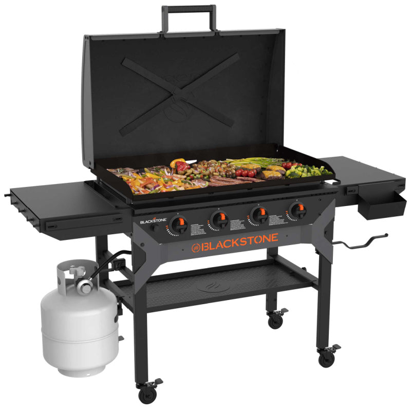 Blackstone 2310 36in Iron Forged Griddle with Hood OPen cooking dinner