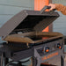 Blackstone 2311 Iron Forged 28in Griddle Opening the Hood