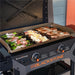 Blackstone 2311 Iron Forged 28in Griddle Full cooking food