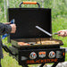Blackstone 2350 22 inch On The Go Omnivore FlexFold Griddle Cooking in the outdoors