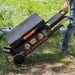 Blackstone 2350 22 inch On The Go Omnivore FlexFold Griddle Folded down being pulled along on wheels