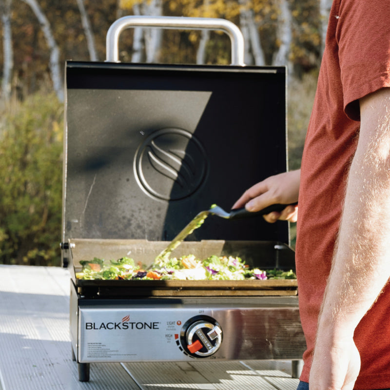 Blackstone 2143 17inch Tabletop Griddle with Hood Cooking on griddle