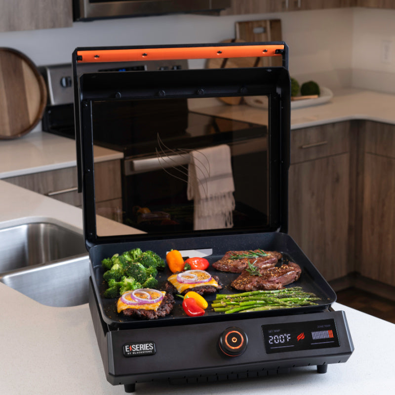 Blackstone 17inch Tabletop Griddle open hood cooking food