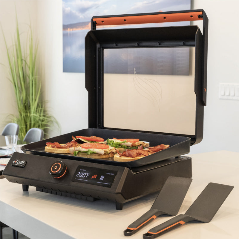 Blackstone 17inch Tabletop Griddle on bench with accessory tools