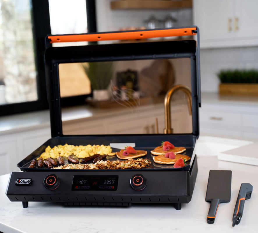 Blackstone 22inch E Series Electric Griddle open hood cooking breakfast with accessories