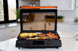 Blackstone 22inch E Series Electric Griddle open hood cooking food