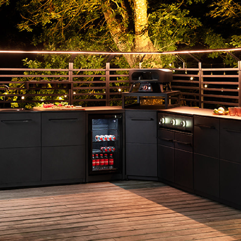 Cozze® Elements Fridge with outdoor kitchen at night