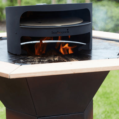 Barbecook Dynamic Pizza oven on flame
