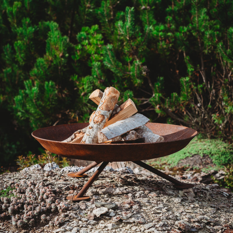 GrillSymbol_Corten_Steel_Fire_Pit_Alta_on_stones
