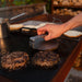 GrillSymbol Charcoal Grill Naked Chef XXL grilling meat patties using burger press