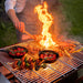 GrillSymbol Charcoal Grill Naked Chef XXL grilling outside at night