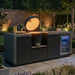 Maze Ember Linear kitchen with Kamado Grill Lid open, Storage Sink and Fridge at night