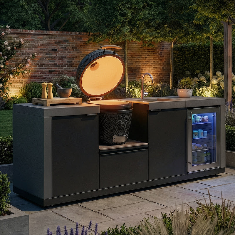 Maze Ember Linear kitchen with Kamado Grill Lid open, Storage Sink and Fridge at night