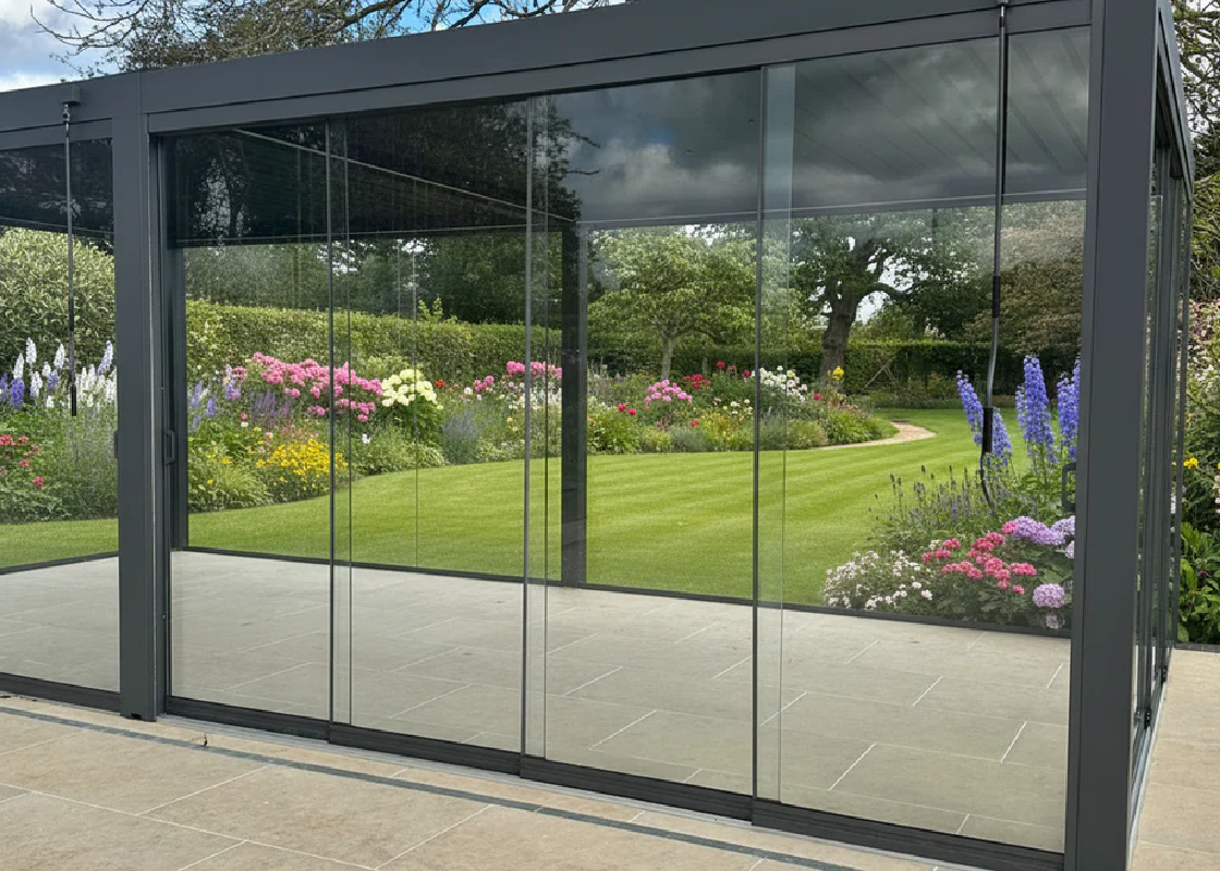 Suns Lifestyle Luxe glass sliding door in garden