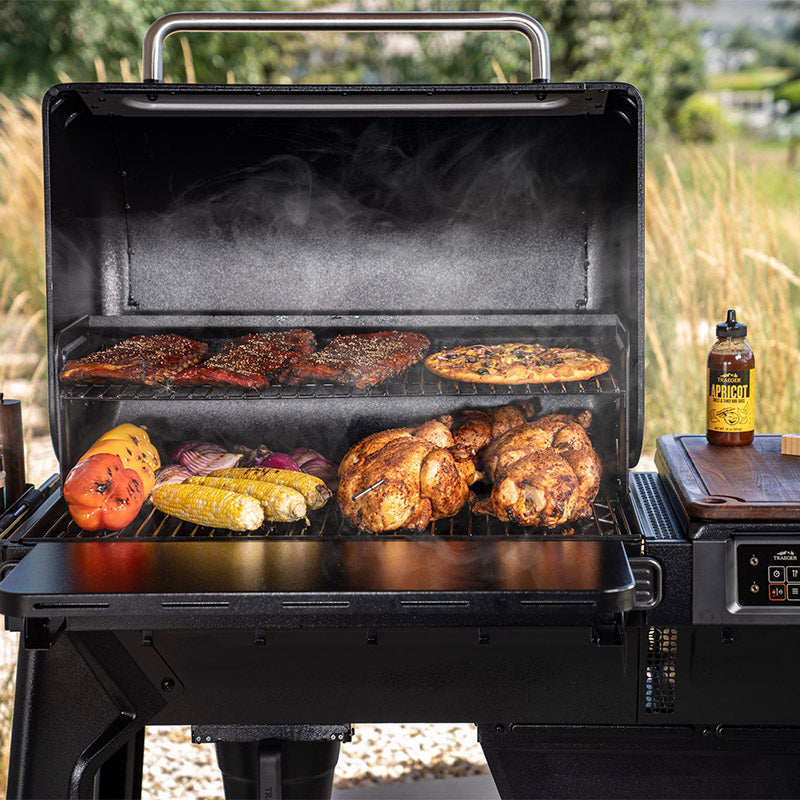 Traeger Woodridge close up of grills full of food cooking
