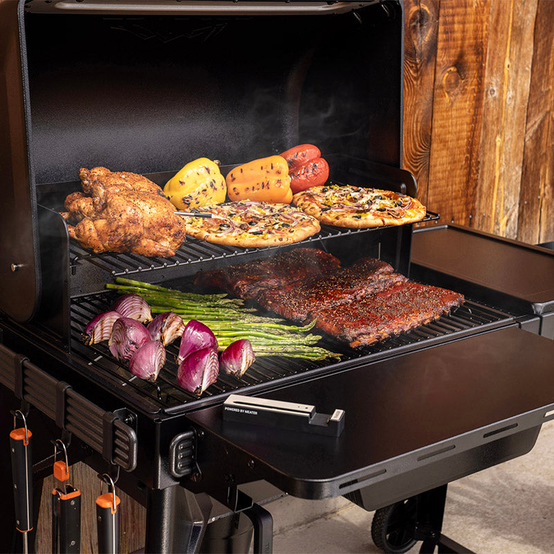 Traeger Woodridge hood open grilling left angle with prep area close up