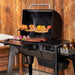 Traeger Woodridge hood open grilling right angle with prep area